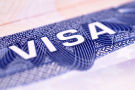 Closeup detail of a US visa document. Closeup detail of a US visa document.